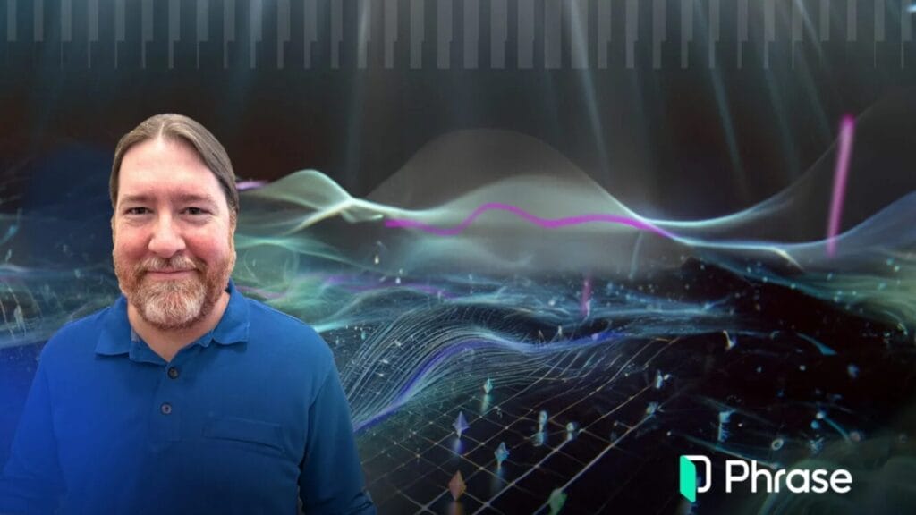 A photo of David McNamee, Enterprise Solutions Engineer at Phrase, wearing a blue shirt and smiling. The background features futuristic abstract graphics with flowing digital waves, grids, and bright light effects, alongside the Phrase logo in the bottom right corner.