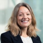 Simone Bohnenberger-Rich standing with folded arms