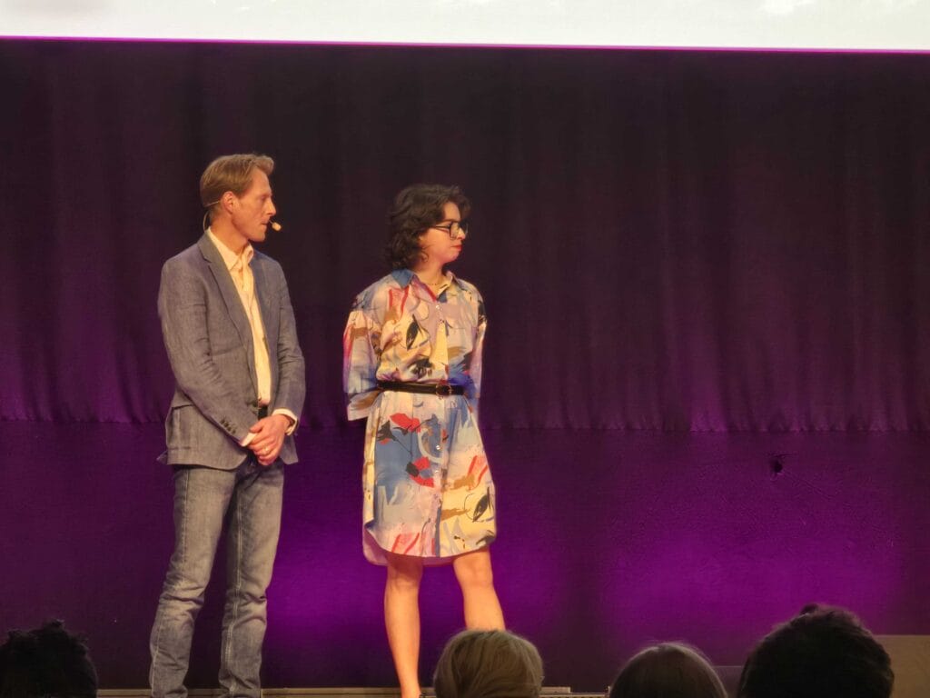 Phrase's Georg Ell and Maxon's Olga Stokowiec take the prize at LocWorld 53