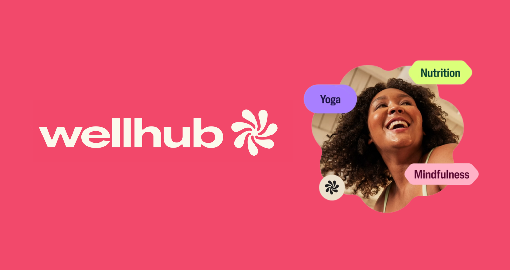 WellHub logo on coral background with smiling woman and colorful wellness category tags including Yoga, Nutrition, and Mindfulness